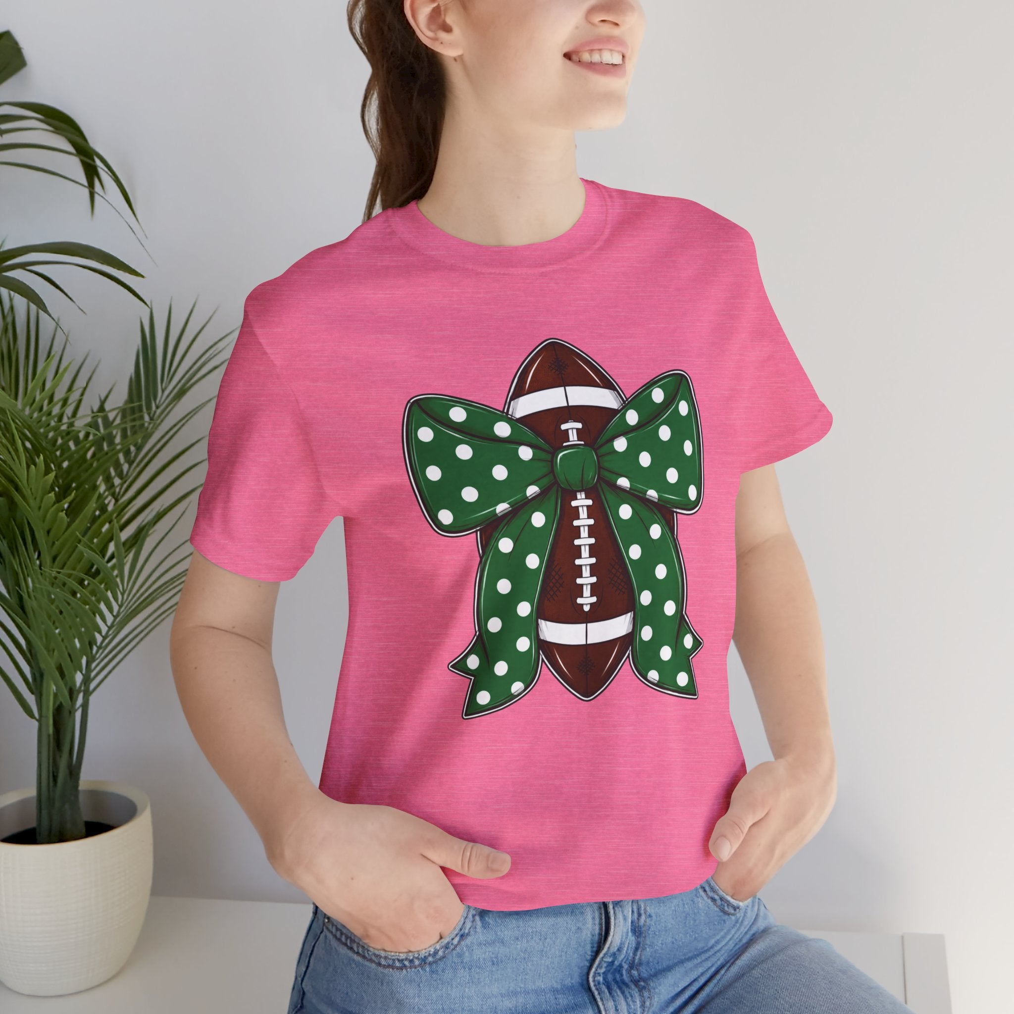 Football Bow T-Shirt — Green Polka Dot Bow Over Football Graphic