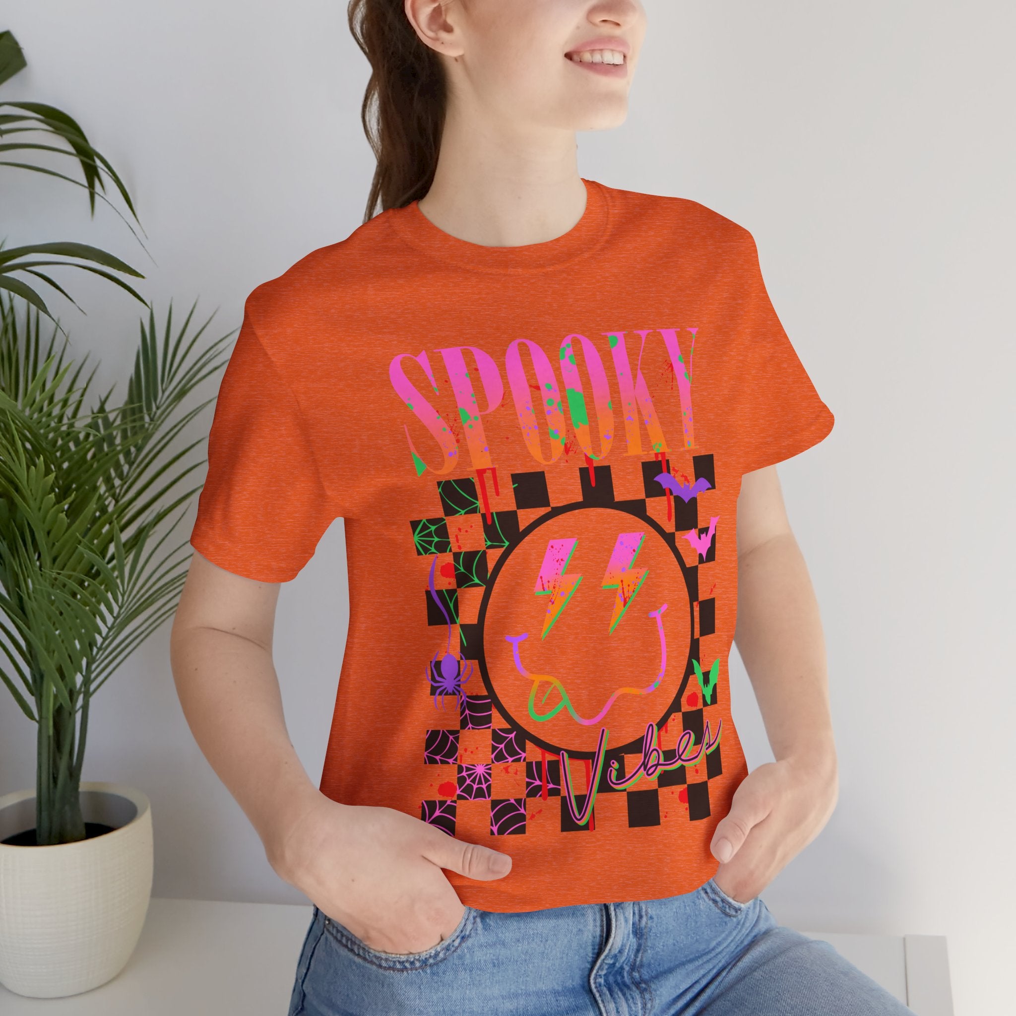 Spooky Checkerboard Tee — Neon Ghost Lightning Graphic T‑Shirt