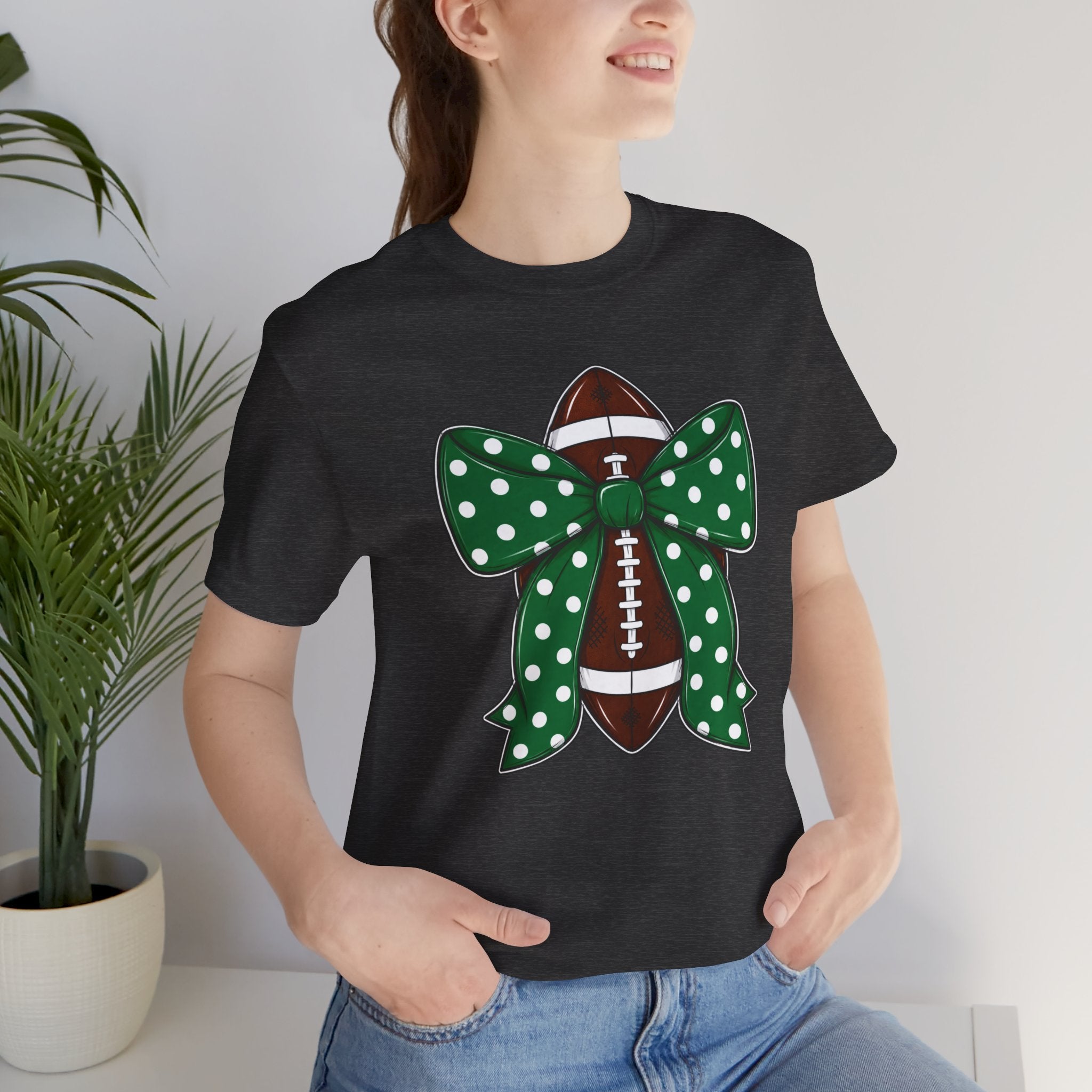 Football Bow T-Shirt — Green Polka Dot Bow Over Football Graphic