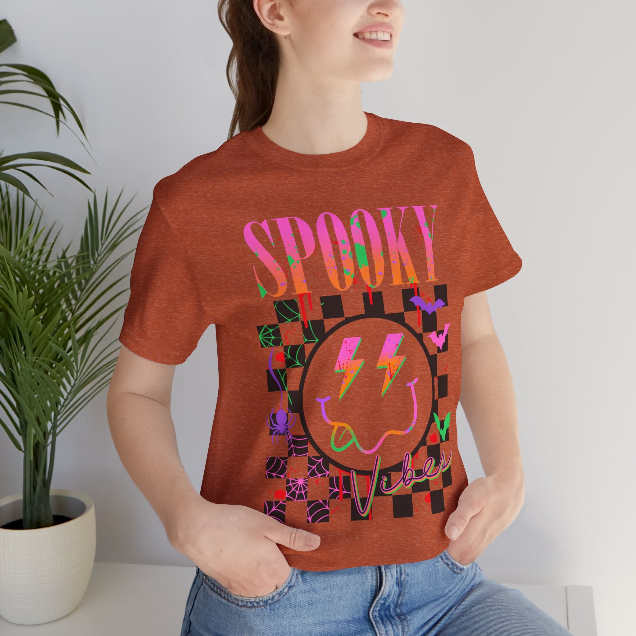 Spooky Checkerboard Tee — Neon Ghost Lightning Graphic T‑Shirt